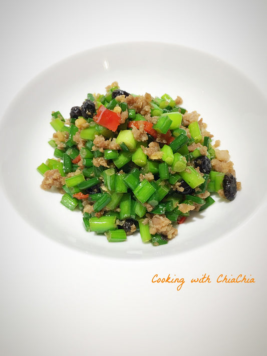 Fly's Head 蒼蠅頭 (aka                                                  Sauté Garlic Chive Flower with Pork and Fermented Black Beans)